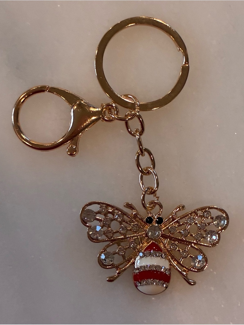 Gold-Tone Bee Keychain with Red & White Enamel Accent bag charm